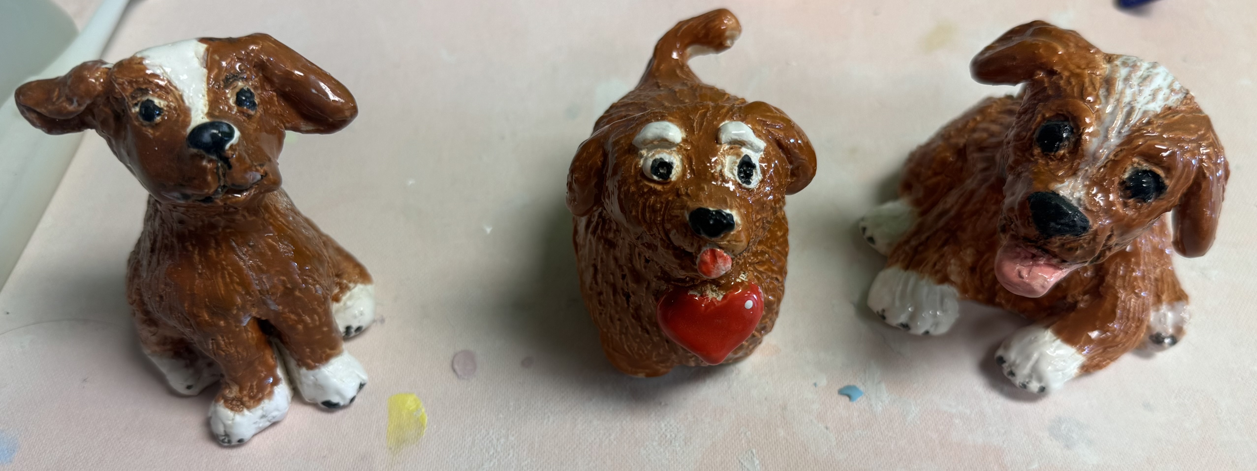 Clay dogs made at a studio party